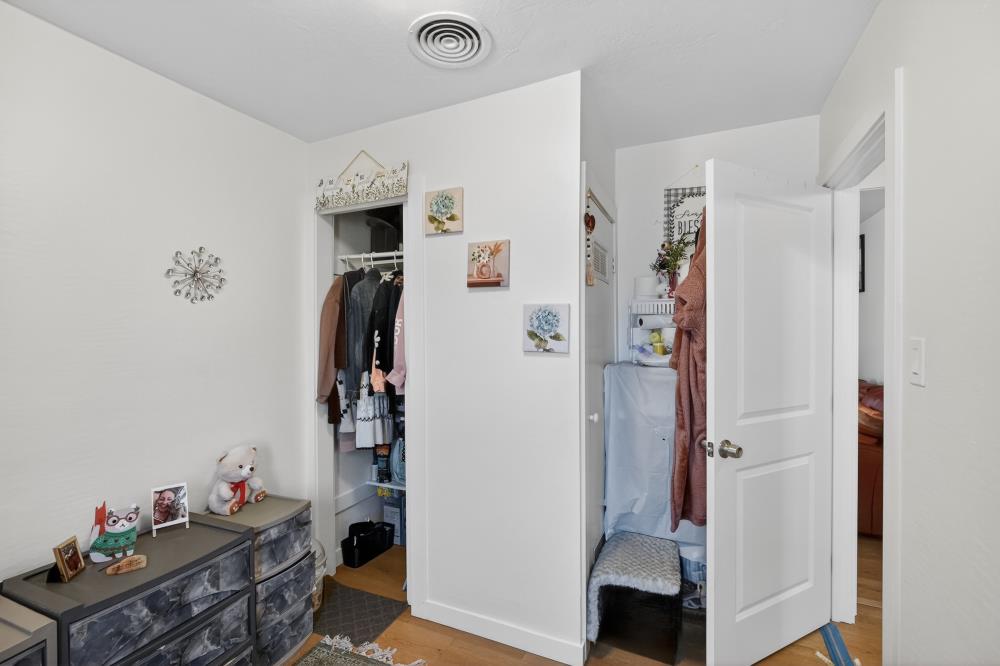 33554 7th Street Union City, CA 94587 - Photo 18 of 38 a view of walk in closet with clothes and shoes