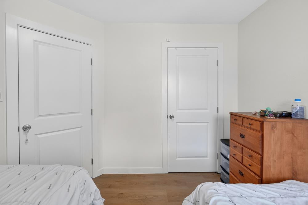 33554 7th Street Union City, CA 94587 - Photo 20 of 38 a bedroom with a bed and a dresser