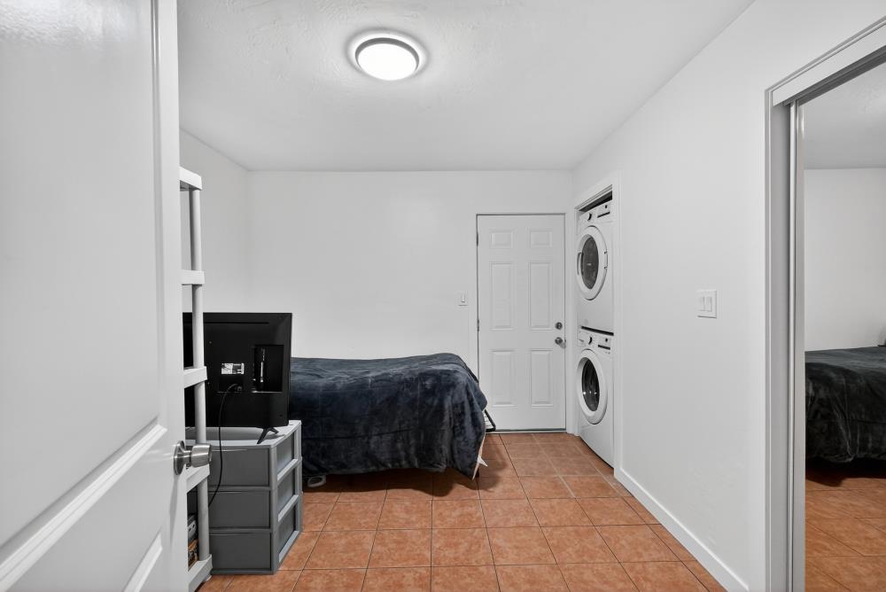 33554 7th Street Union City, CA 94587 - Photo 22 of 38 a living room with furniture and a flat screen tv