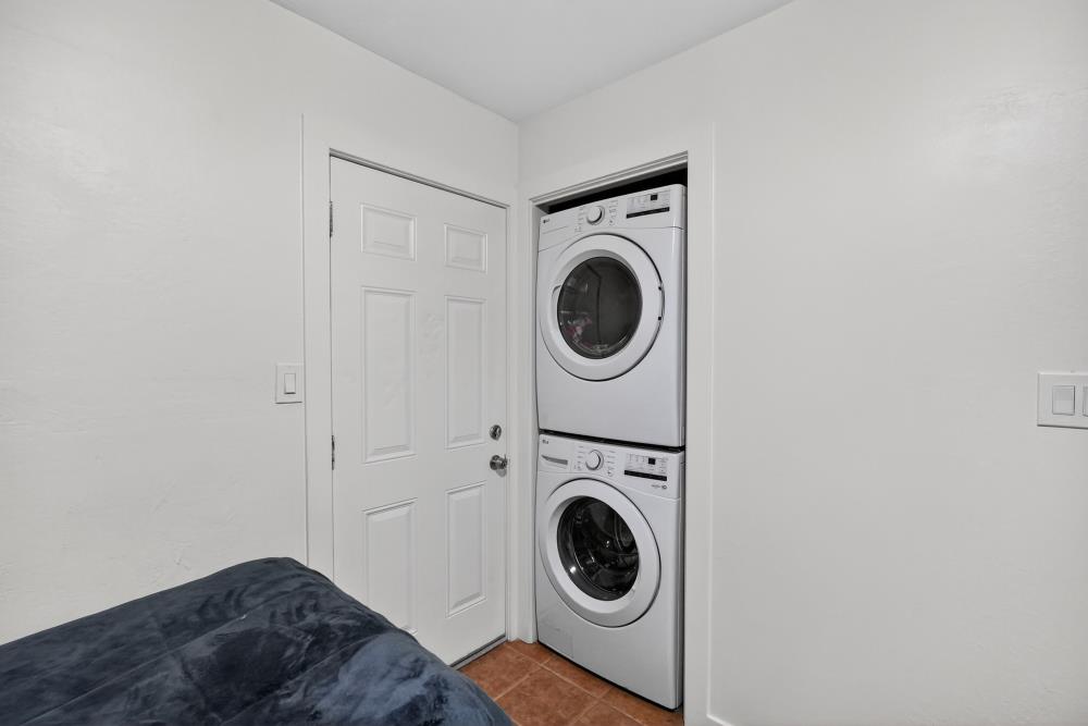33554 7th Street Union City, CA 94587 - Photo 24 of 38 a view of a bedroom with washer and dryer