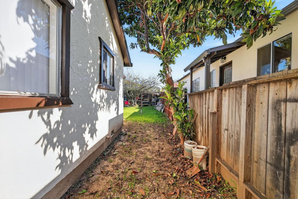 33554 7th Street Union City, CA 94587 - Photo 25 of 38 a view of a pathway of a house with a yard