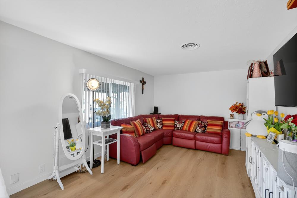 33554 7th Street Union City, CA 94587 - Photo 7 of 38 a living room with furniture and a wooden floor