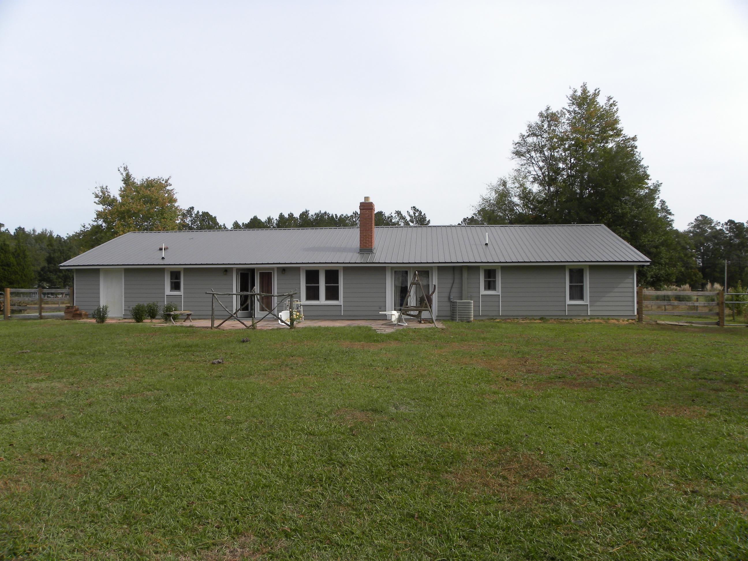 1395 Risher Mountain Road Walterboro, SC 29488 - Photo 14 of 16 Spacious back yard and patio