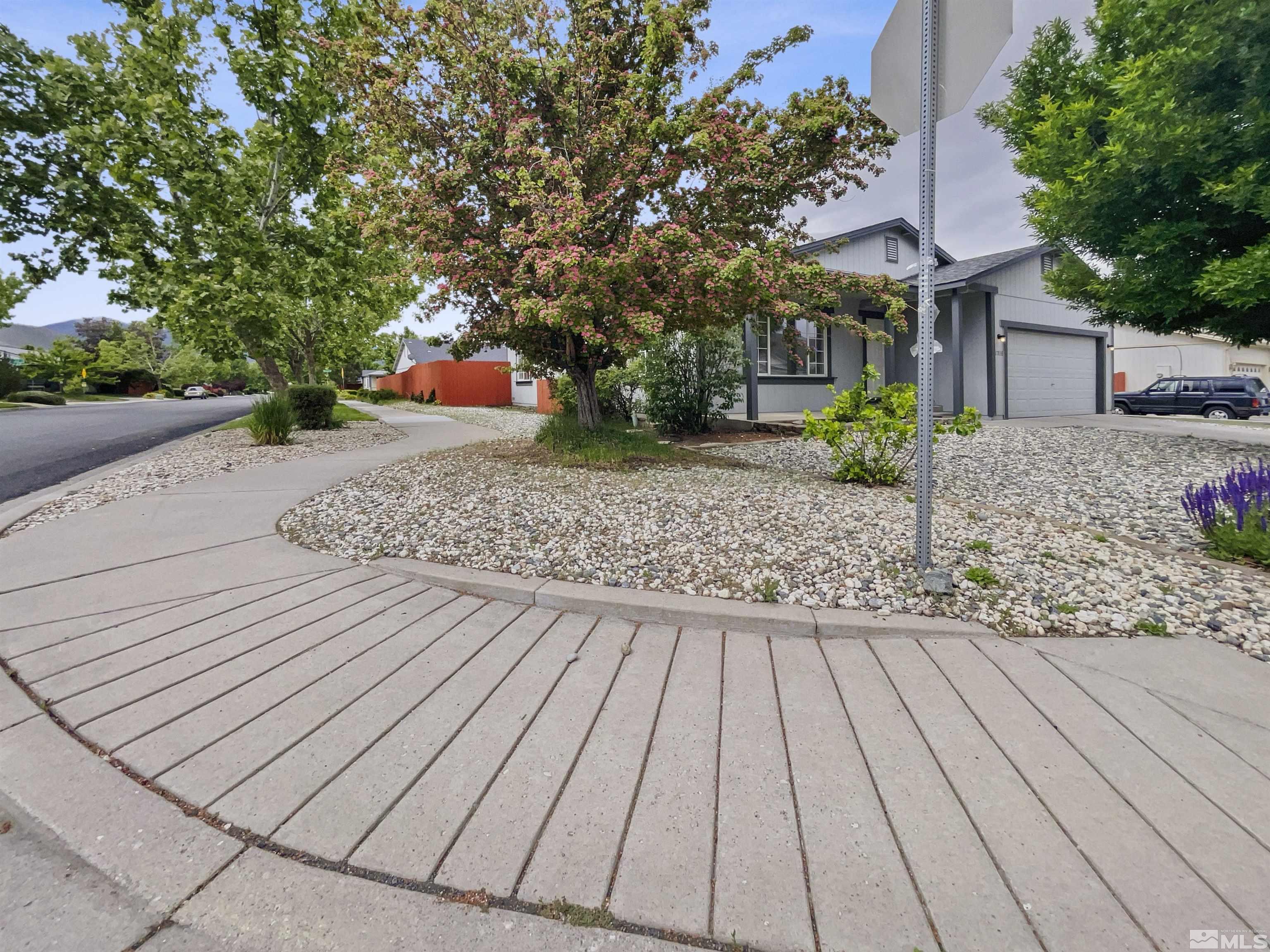 17838 Empire Court Reno, NV 89508 - Photo 20 of 20 a front view of a house with a yard