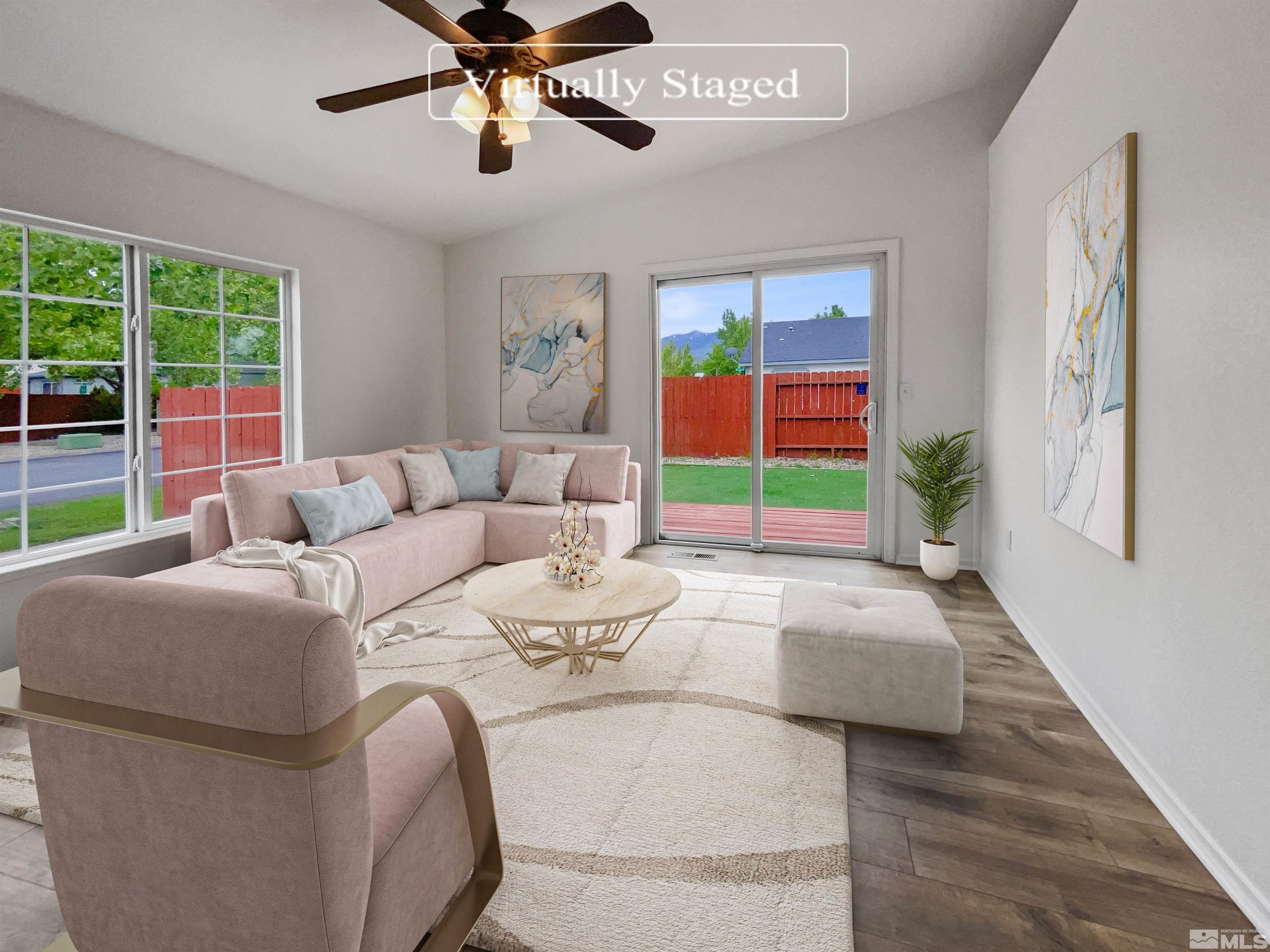 17838 Empire Court Reno, NV 89508 - Photo 2 of 20 a living room with furniture and a window