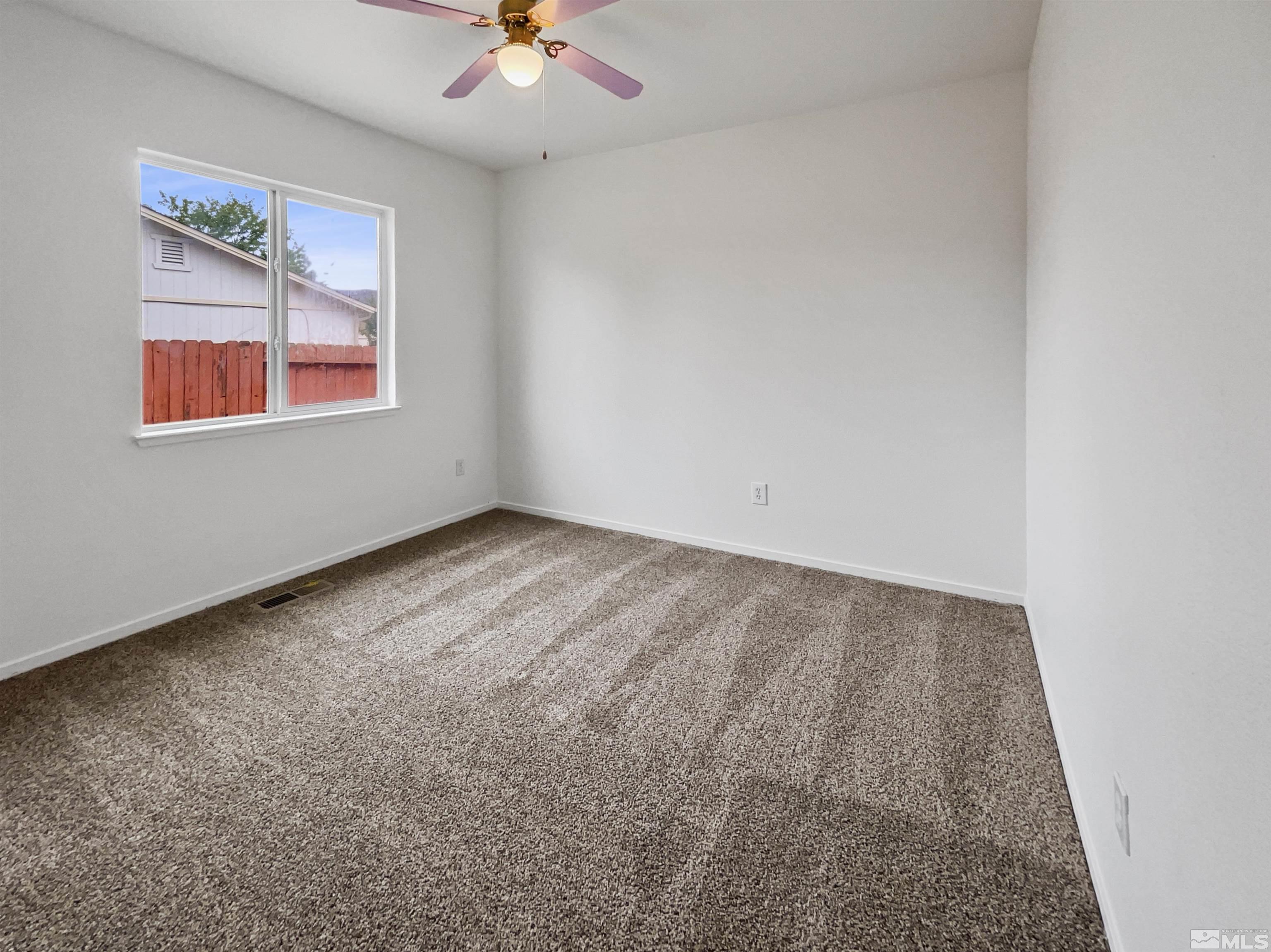 17838 Empire Court Reno, NV 89508 - Photo 8 of 20 an empty room with a window
