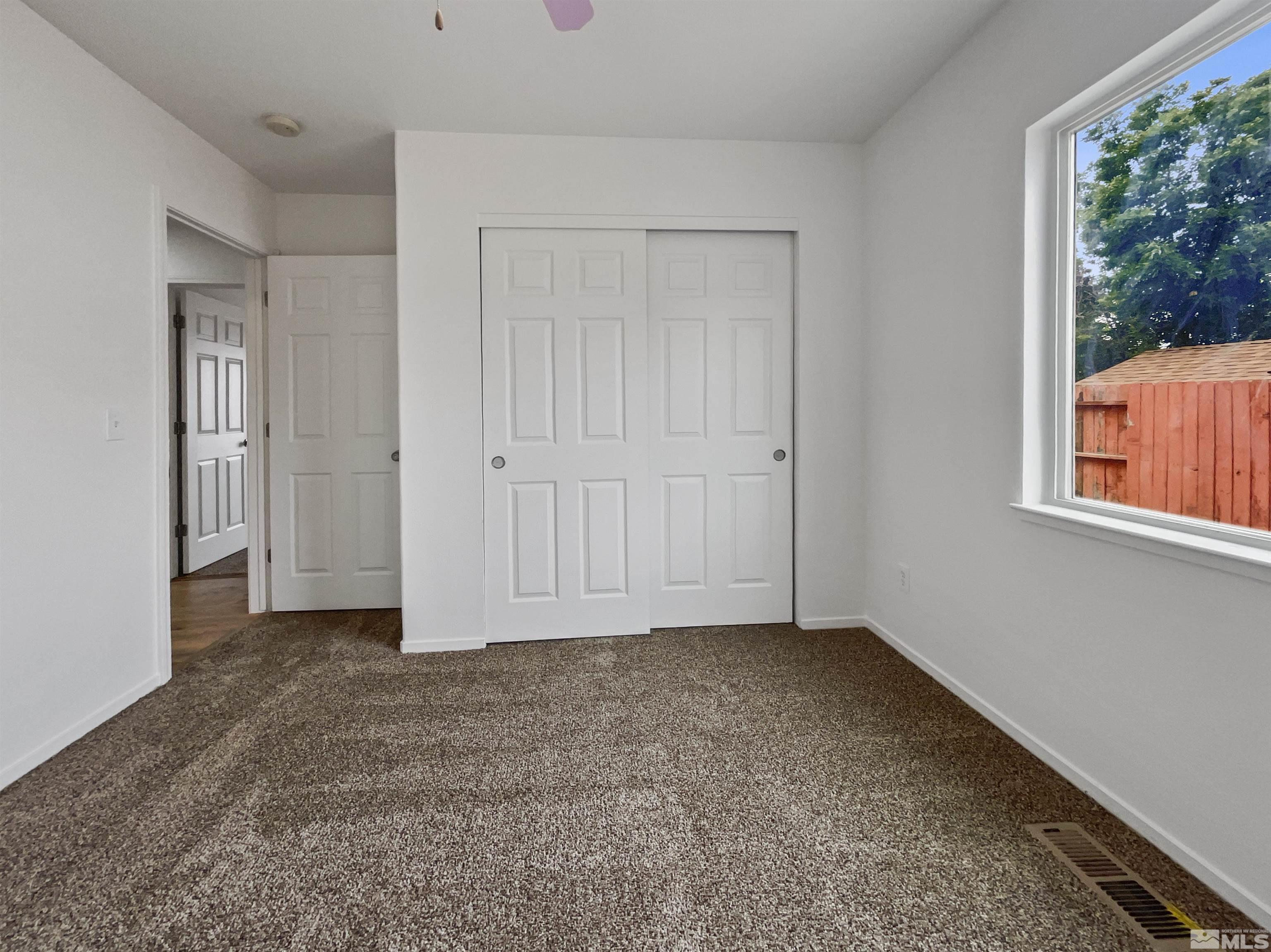 17838 Empire Court Reno, NV 89508 - Photo 9 of 20 a view of an empty room with a window