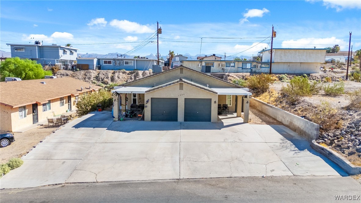 1584 Turquoise Road Bullhead City, AZ 86442 - Photo 1 of 14 Front of Structure