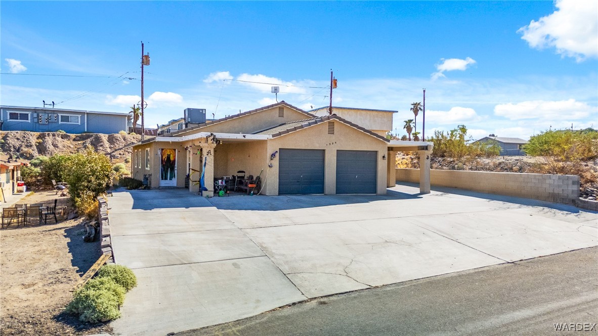 1584 Turquoise Road Bullhead City, AZ 86442 - Photo 2 of 14 Front of Structure