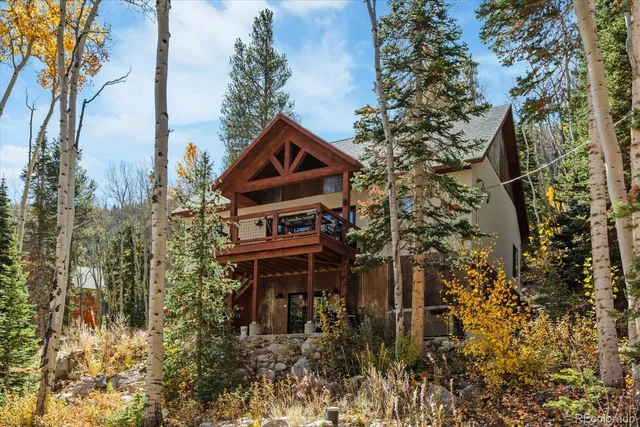 a pathway of a house with a tree