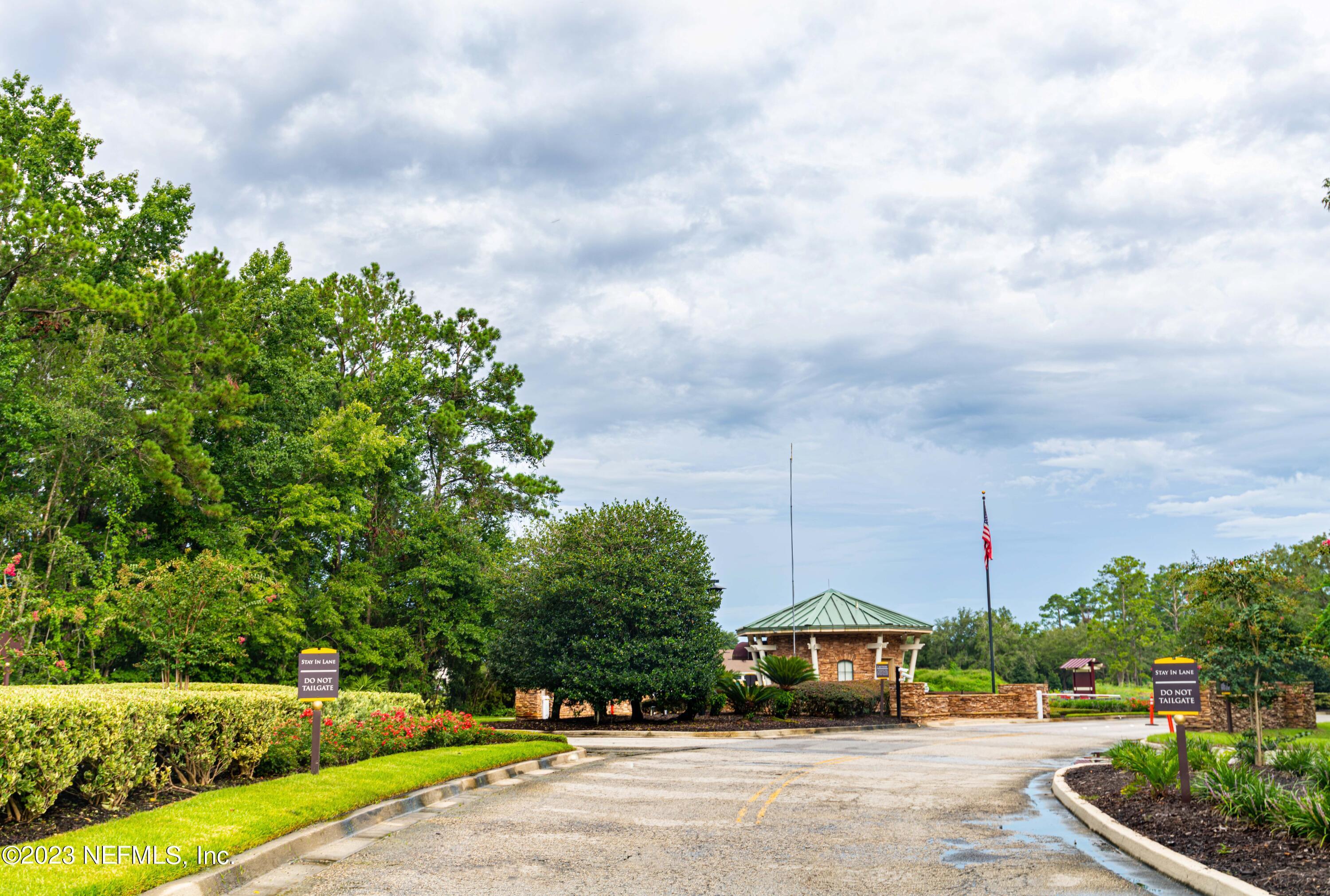 945 Registry Boulevard, Unit 212 St. Augustine, FL 32092 - Photo 11 of 26 a car parked on the side of the road