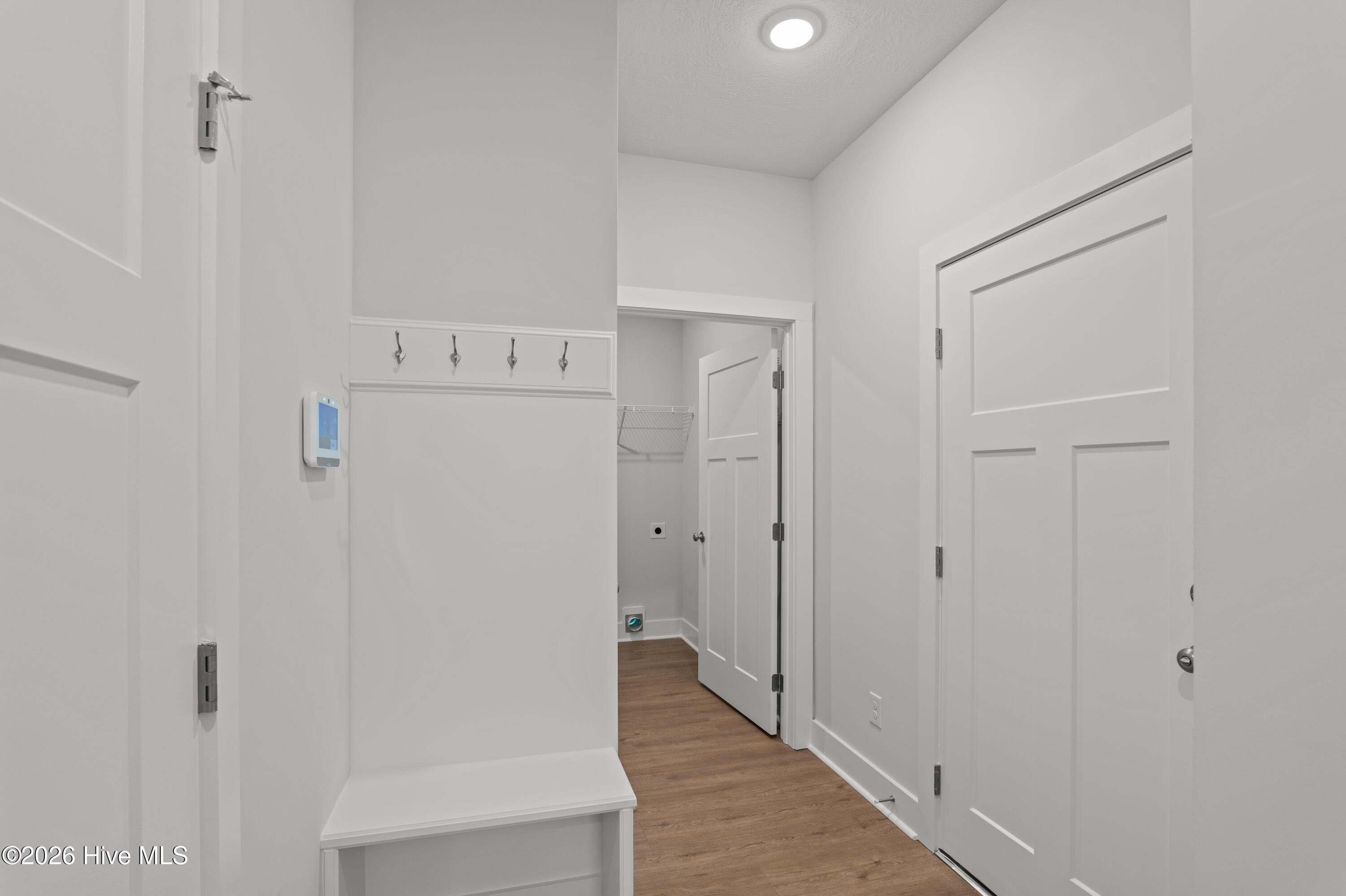 668 Ronaldsay Road Grovetown, GA 30813 - Photo 23 of 49 Hallway to Garage, Half Bath, and Laundry