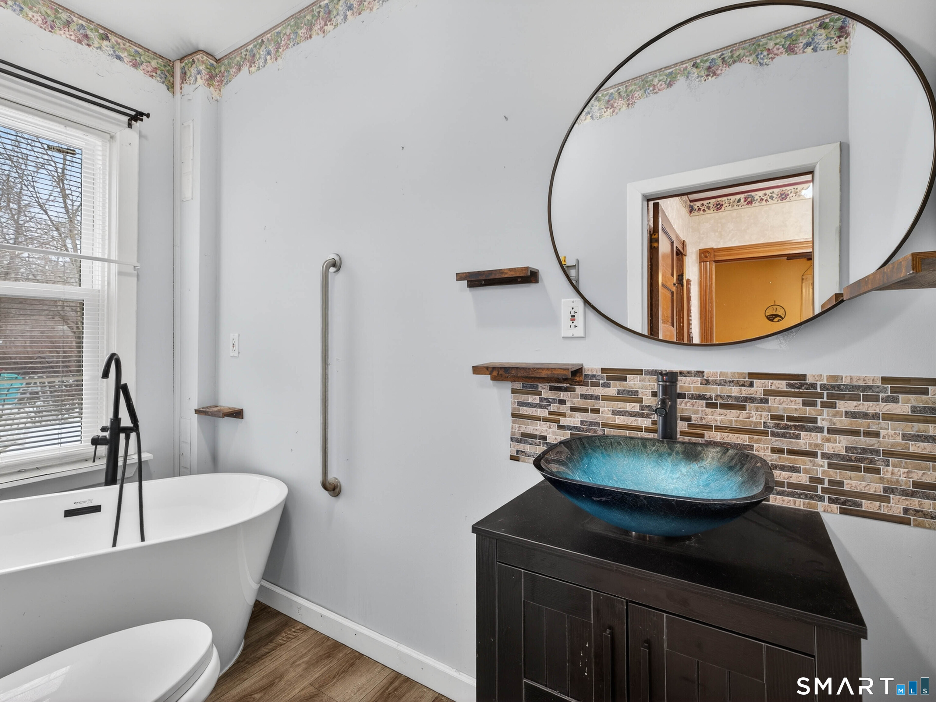 25 Torrey Lane Plainfield, CT 06332 - Photo 11 of 35 a bathroom with a sink and a mirror