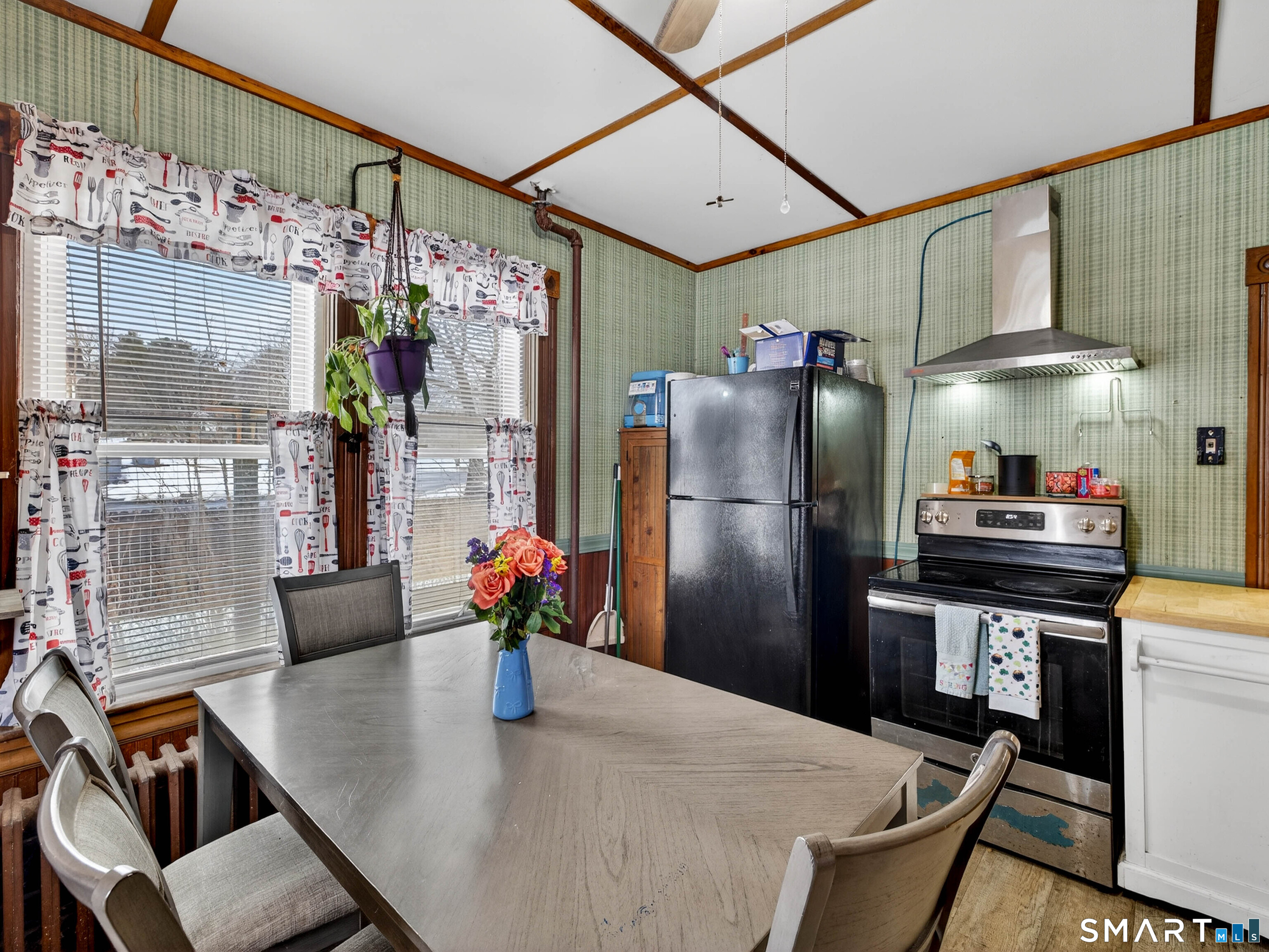 25 Torrey Lane Plainfield, CT 06332 - Photo 16 of 35 a kitchen with stainless steel appliances granite countertop a refrigerator a stove top oven a sink and dishwasher