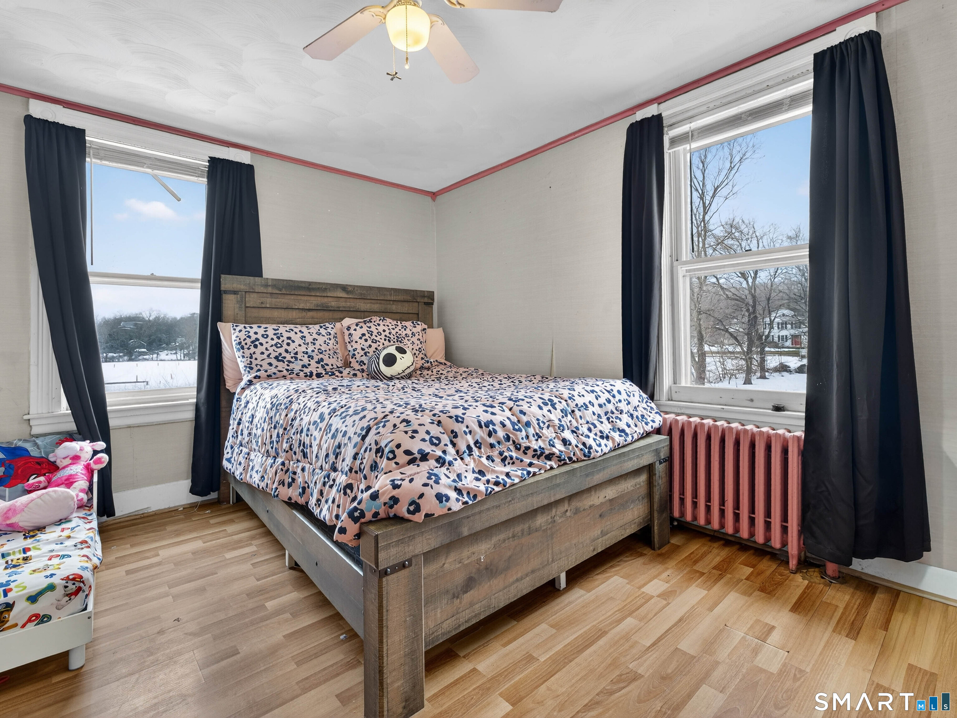 25 Torrey Lane Plainfield, CT 06332 - Photo 17 of 35 a bedroom with a bed and wooden floor