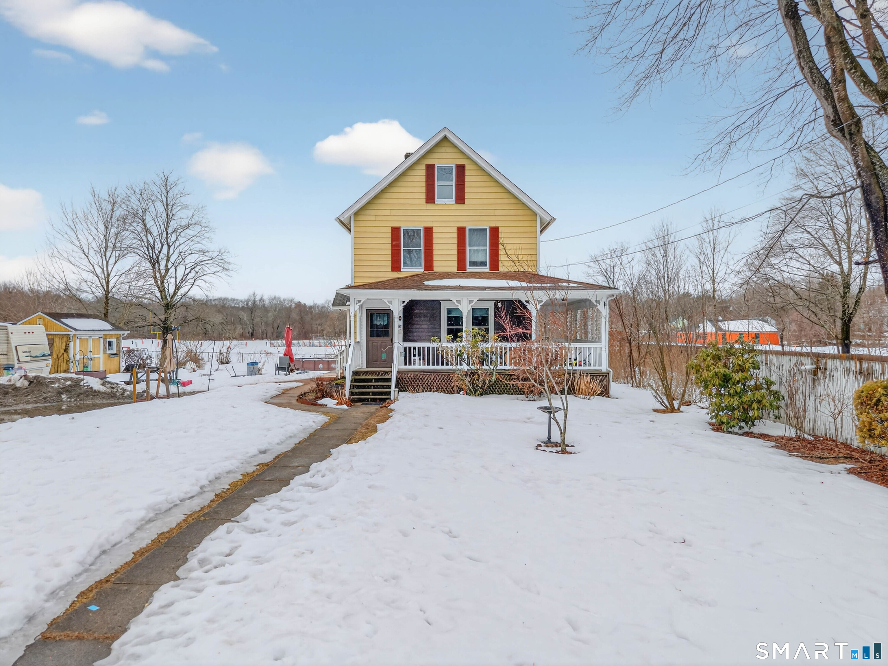 25 Torrey Lane Plainfield, CT 06332 - Photo 2 of 35 a view of house with yard and sitting area