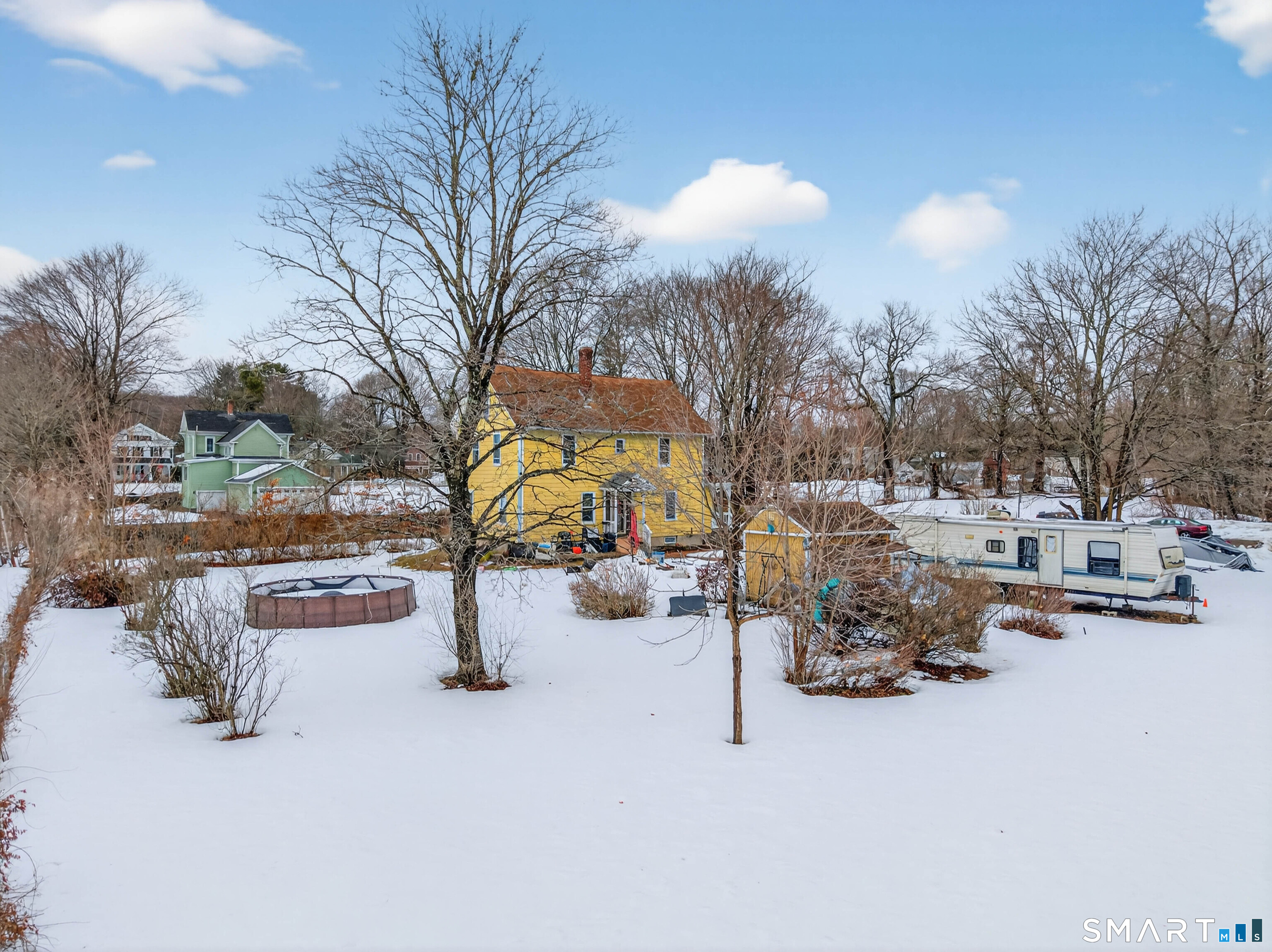 25 Torrey Lane Plainfield, CT 06332 - Photo 30 of 35 a view of outdoor space covered with snow and trees