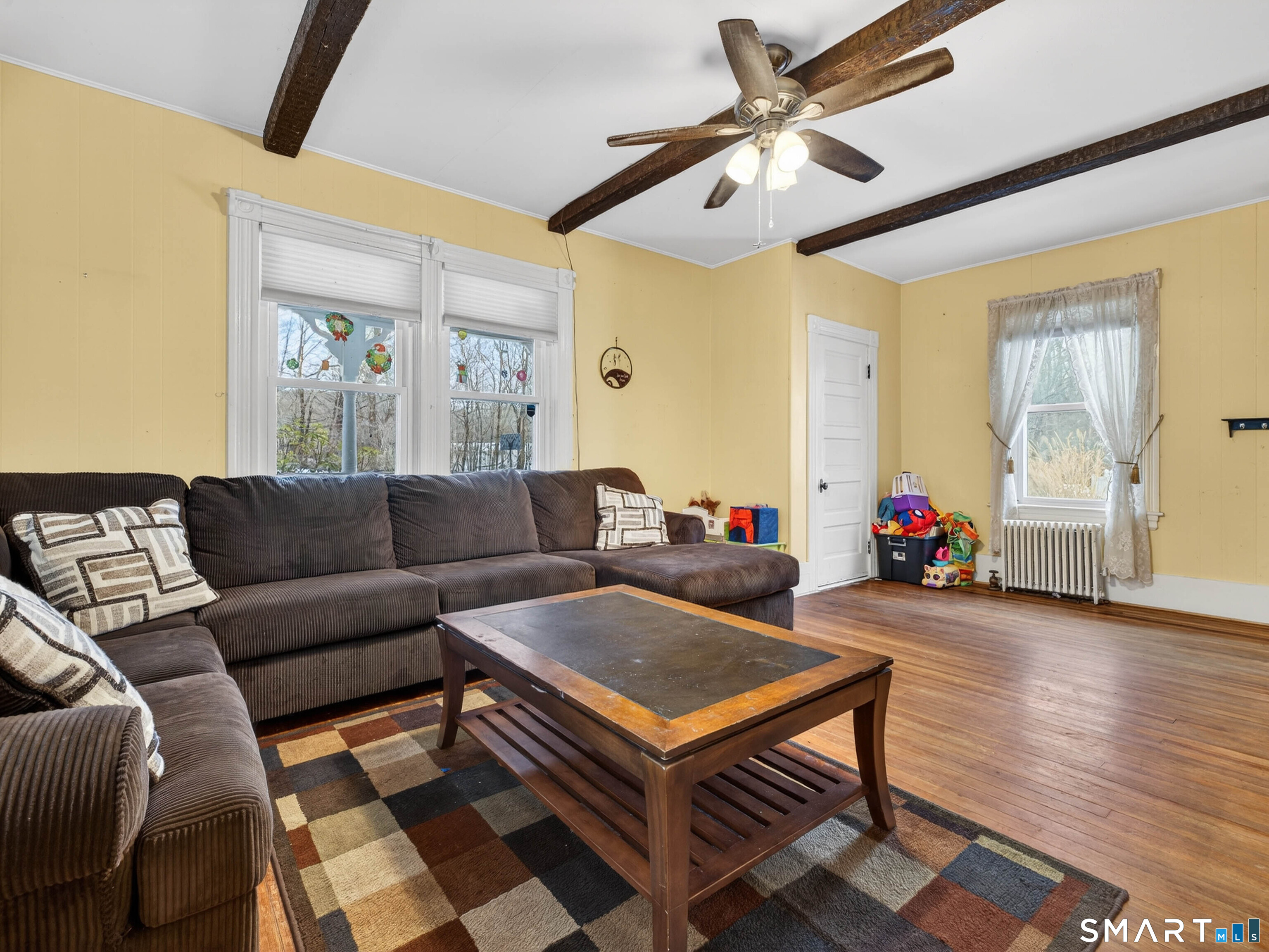 25 Torrey Lane Plainfield, CT 06332 - Photo 5 of 35 a living room with furniture and wooden floor