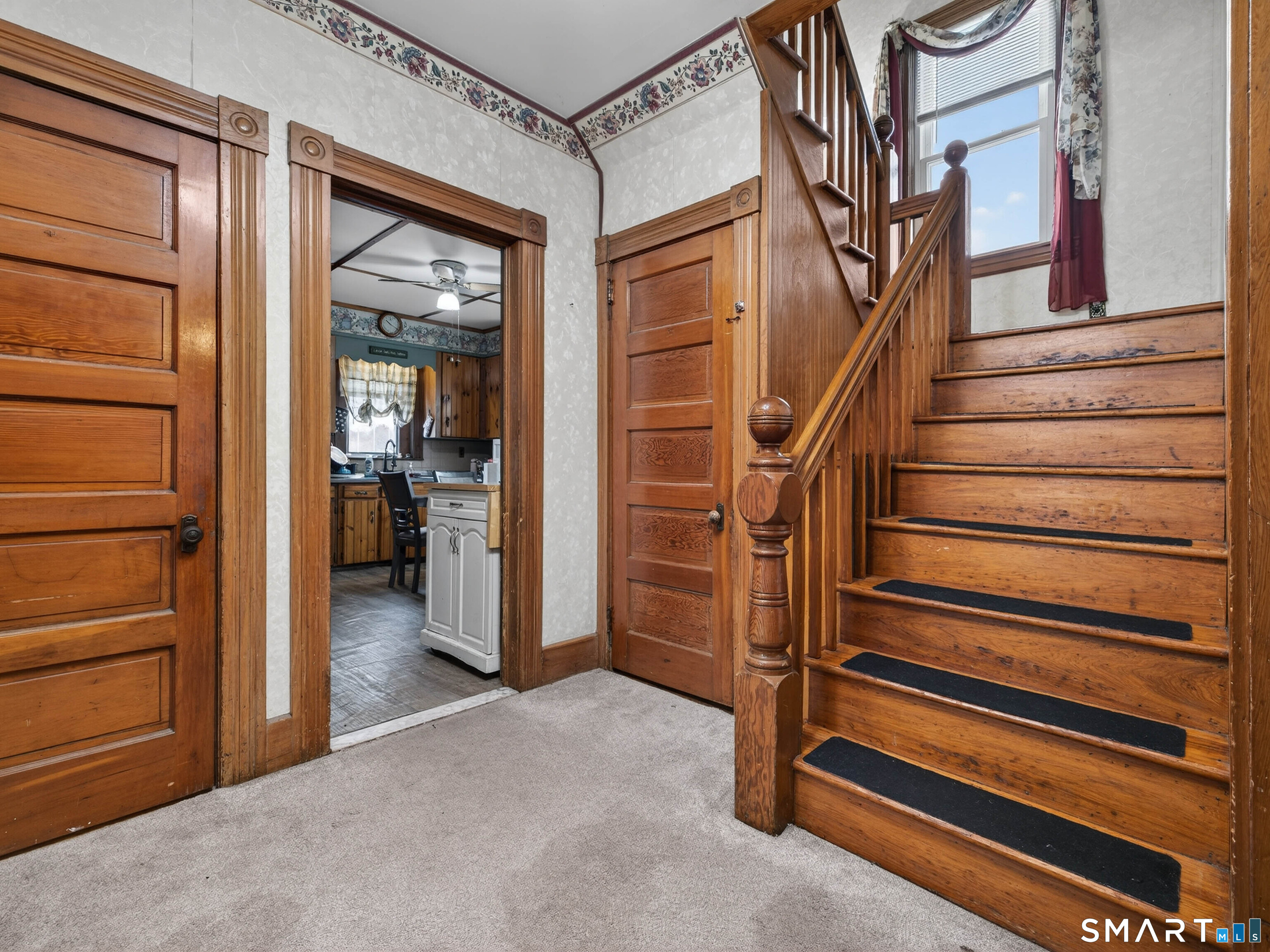 25 Torrey Lane Plainfield, CT 06332 - Photo 9 of 35 a view of a livingroom with a staircase