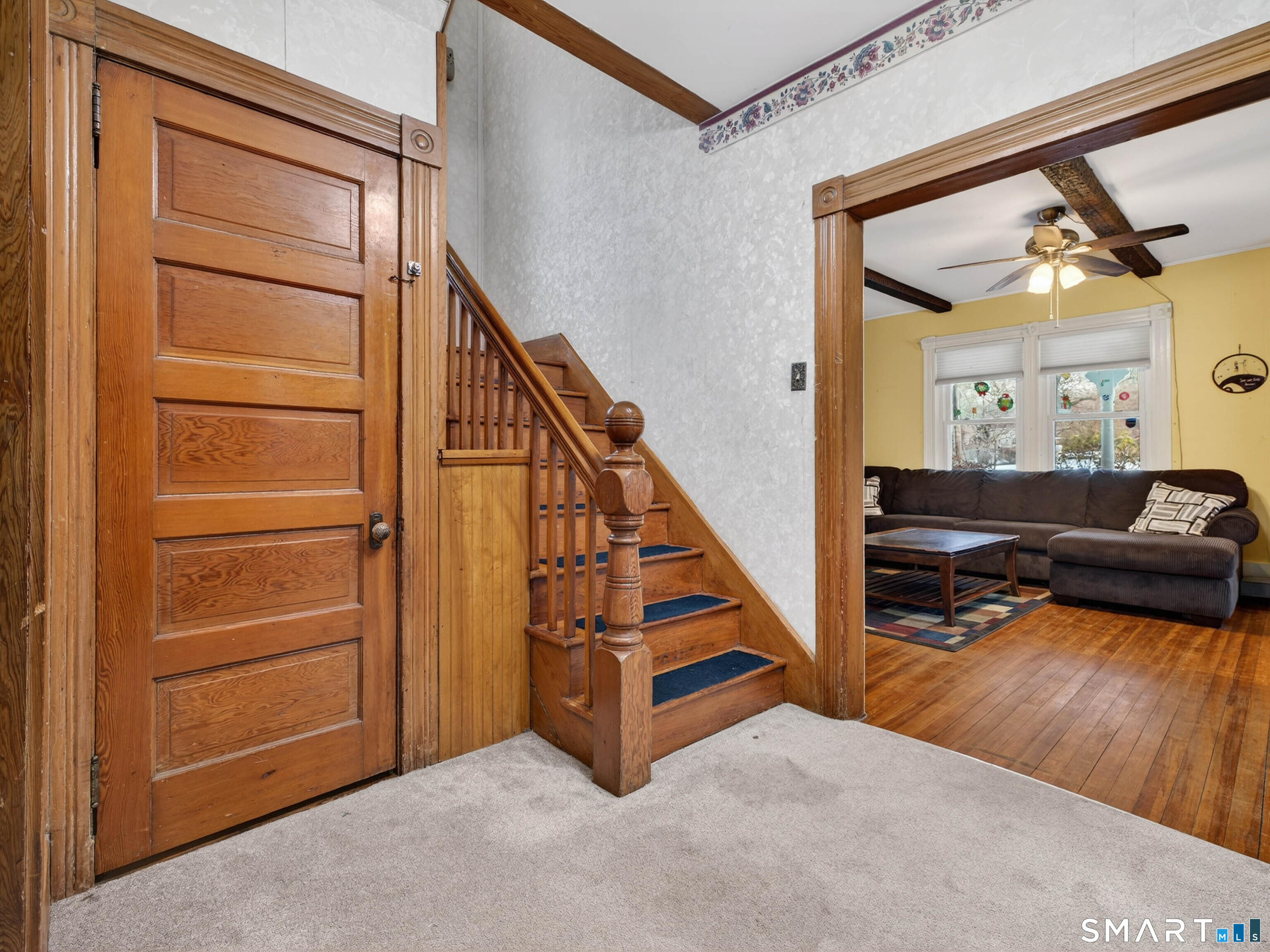 25 Torrey Lane Plainfield, CT 06332 - Photo 10 of 35 a view of a livingroom with furniture and staircase