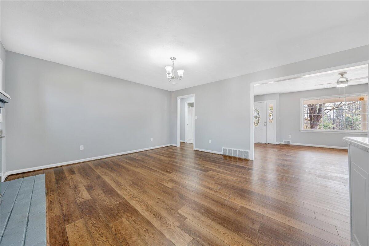 2353 Thompson Ridge Road Ferrum, VA 24088 - Photo 11 of 46 wooden floor in an empty room with a window