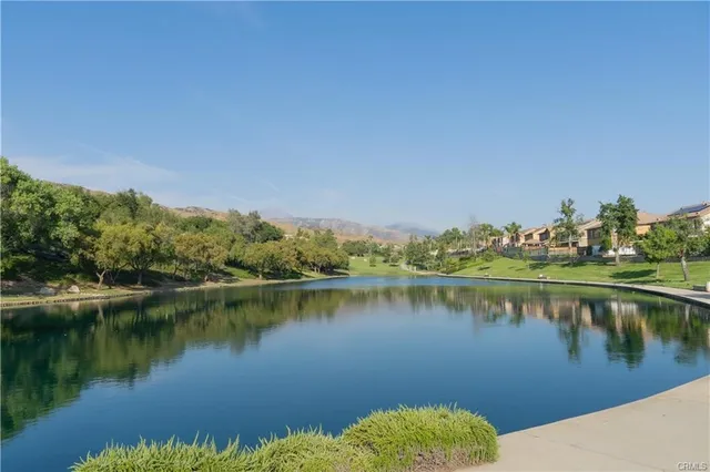 a view of a lake with a city view