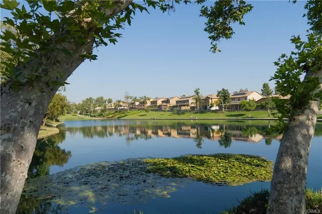 a view of a lake with a big yard