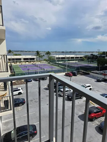 a view of a balcony with an outdoor space
