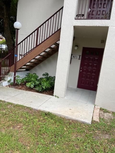 9071 Southwest 141st Place, Unit 9071 Miami, FL 33186 - Photo 3 of 10 a view of entryway with a front door