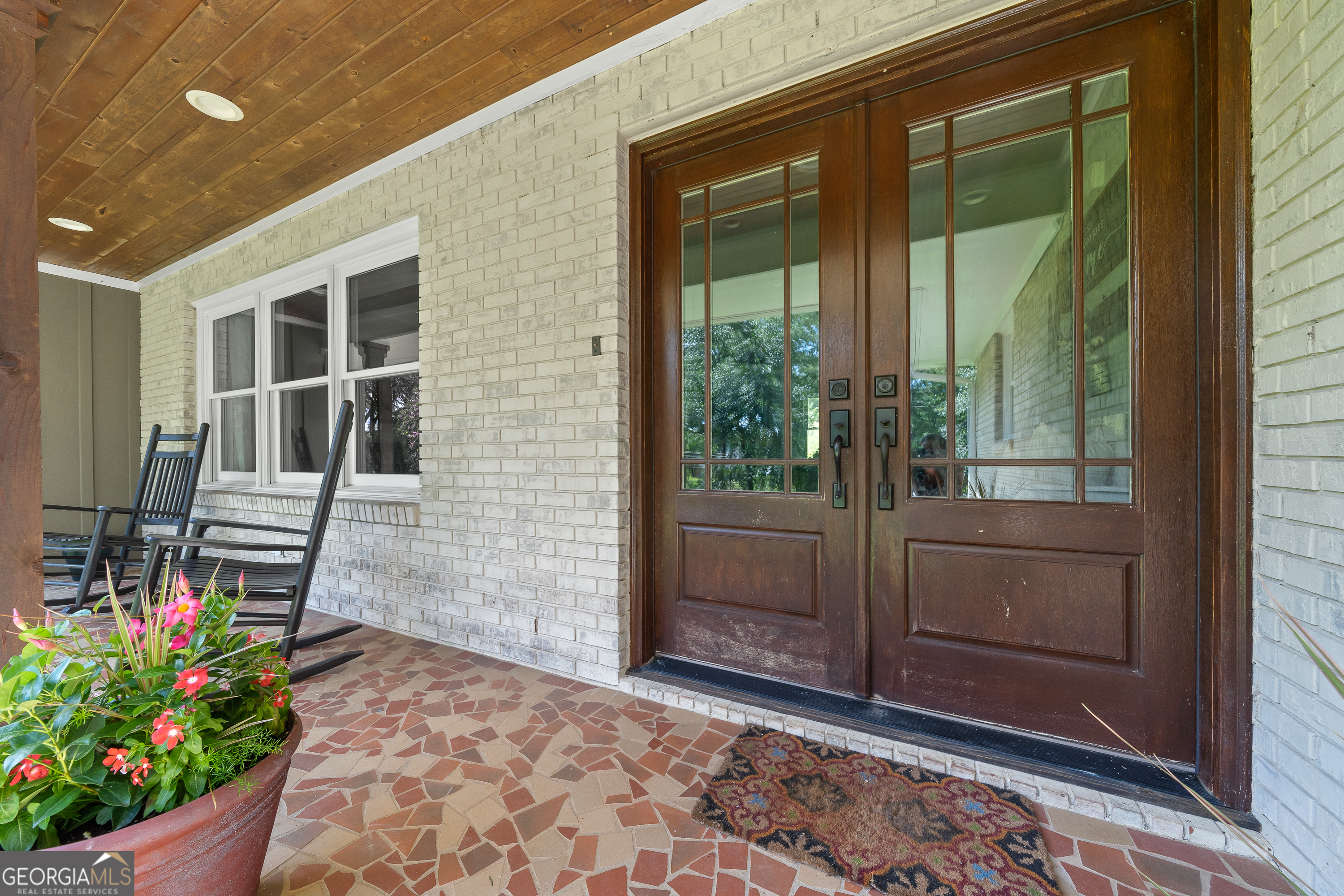 122 Ivey Weaver Road Milledgeville, GA 31061 - Photo 18 of 64 a backyard of a house with outdoor seating