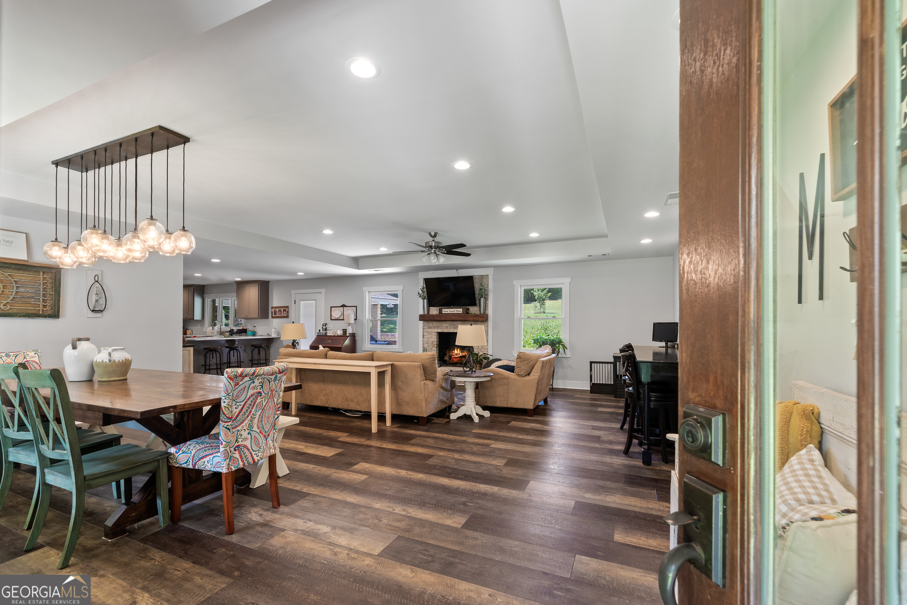 122 Ivey Weaver Road Milledgeville, GA 31061 - Photo 27 of 64 a living room with fireplace furniture and a table