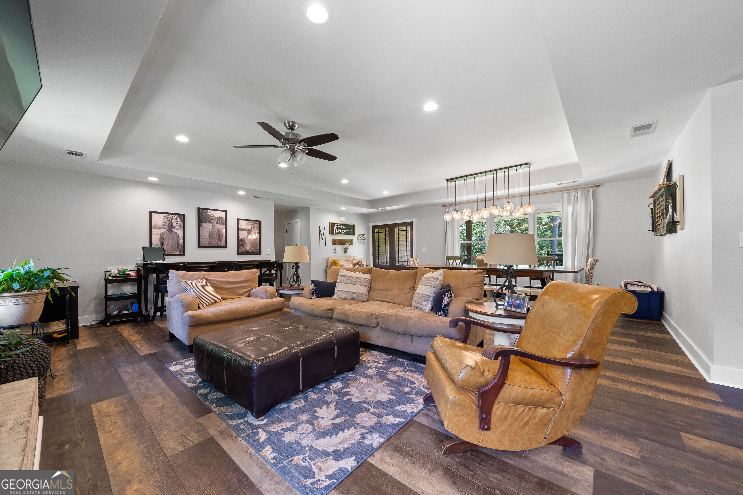 122 Ivey Weaver Road Milledgeville, GA 31061 - Photo 34 of 64 a living room with furniture rug and wooden floor