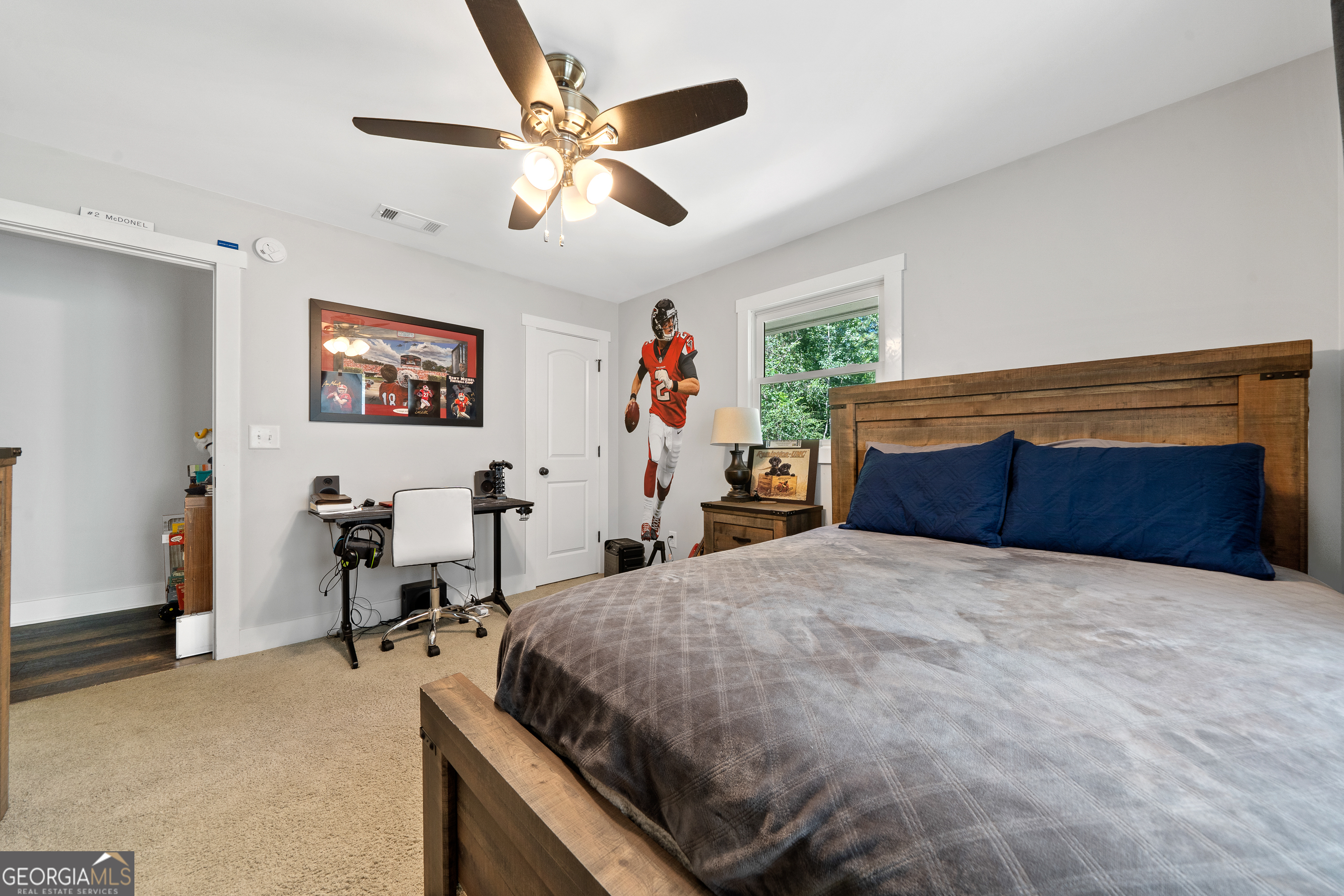 122 Ivey Weaver Road Milledgeville, GA 31061 - Photo 60 of 64 a bed room with a bed and a tv