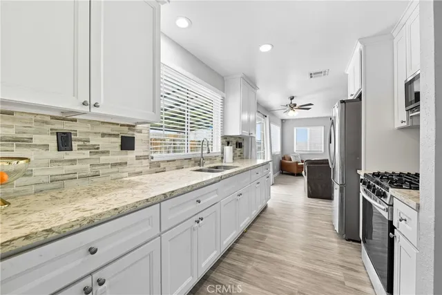 a large kitchen with cabinets
