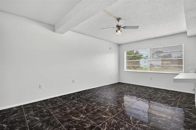 a bathroom with a sink toilet and mirror