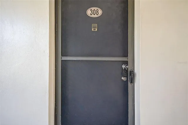 a kitchen with a stove and a refrigerator