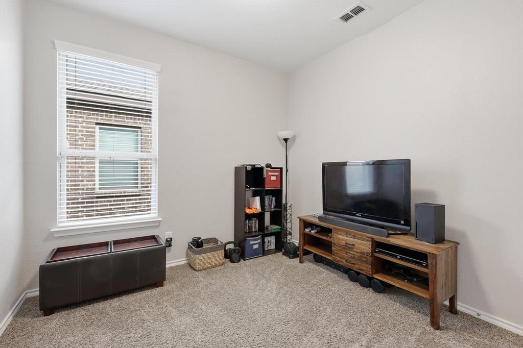 11500 Starlight Ranch Fort Worth, TX 76052 - Photo 29 of 40 This room features light-colored walls and a window with blinds