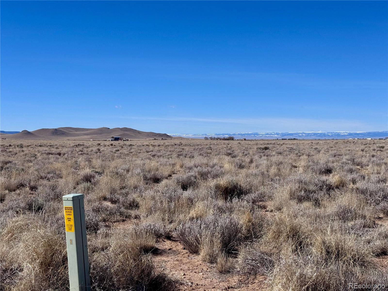 Lot 1 Manitou Springs Road Blanca, CO 81123 - Photo 6 of 12 a view of a dry yard with trees