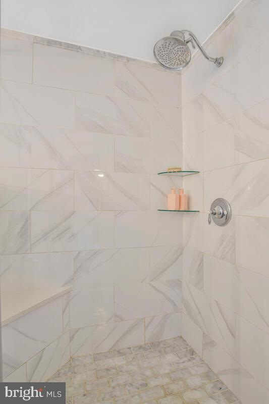 175-m F M F Bowen Road Huntingtown, MD 20639 - Photo 30 of 47 a bathroom with a shower