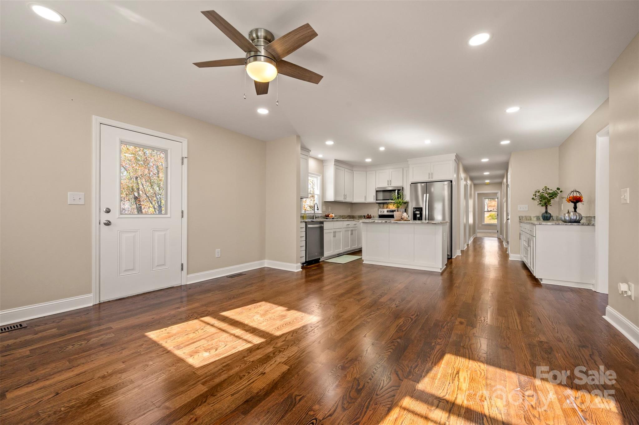 1121 Cove Road Rutherfordton, NC 28139 - Photo 14 of 41 a view of kitchen with cabinets and wooden floor