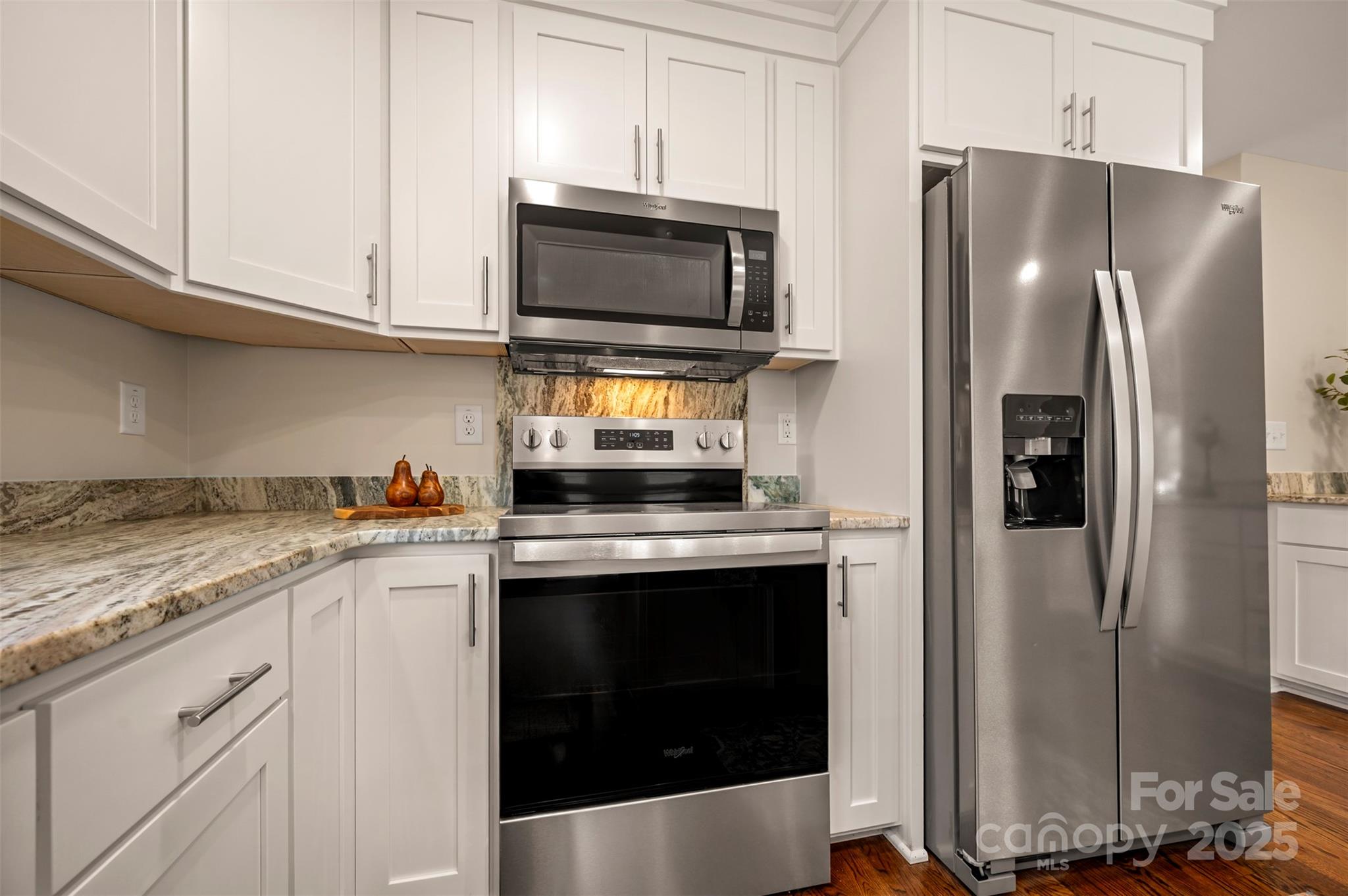 1121 Cove Road Rutherfordton, NC 28139 - Photo 16 of 41 a kitchen with stainless steel appliances granite countertop a refrigerator stove and microwave