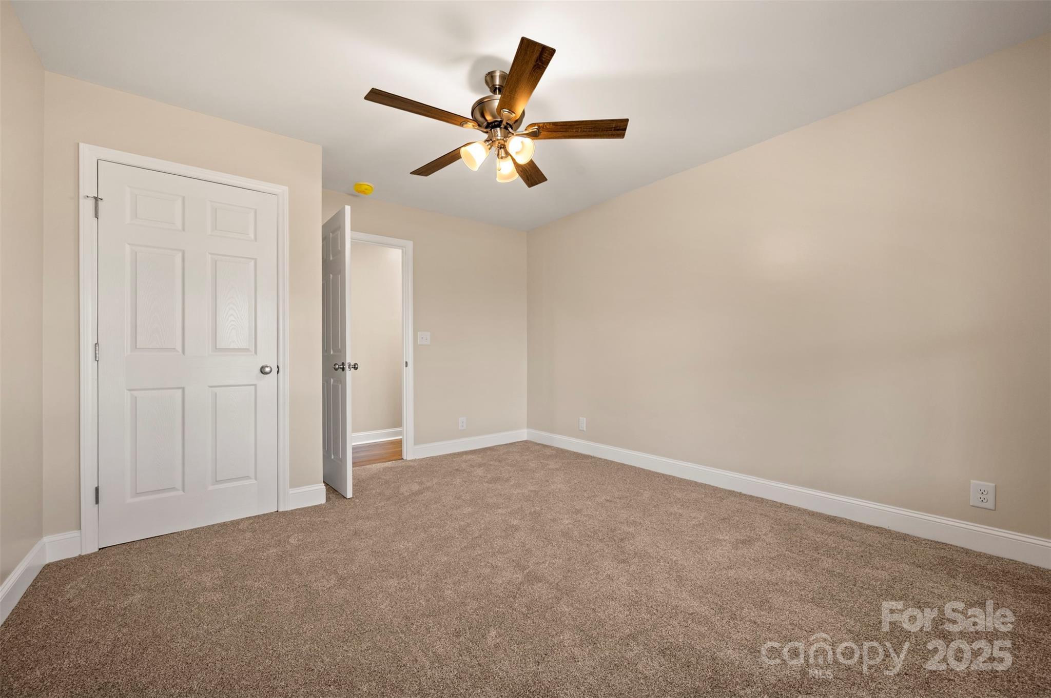 1121 Cove Road Rutherfordton, NC 28139 - Photo 22 of 41 an empty room with closet and windows
