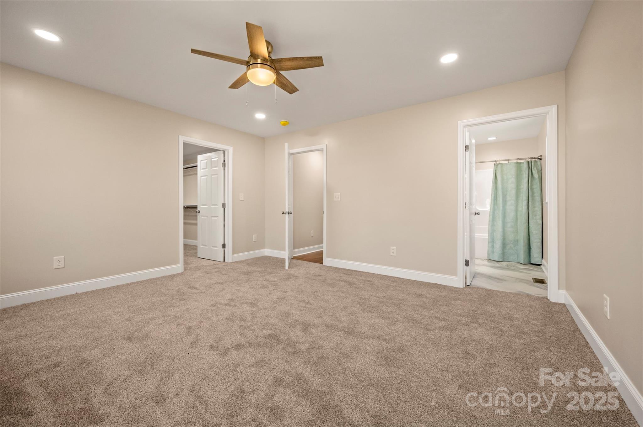 1121 Cove Road Rutherfordton, NC 28139 - Photo 24 of 41 an empty room with closet and fan