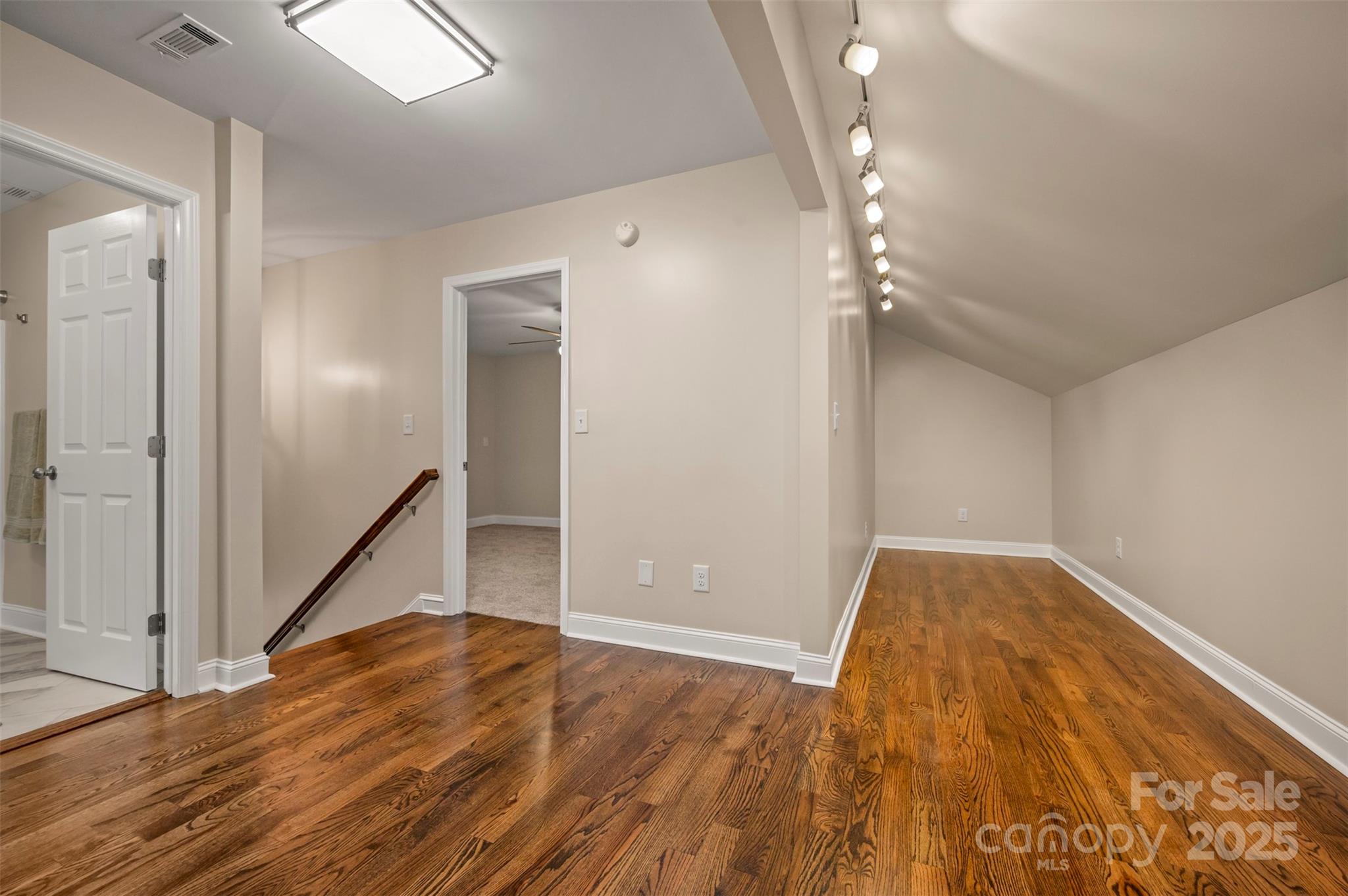1121 Cove Road Rutherfordton, NC 28139 - Photo 27 of 41 wooden floor in an empty room with wooden floor