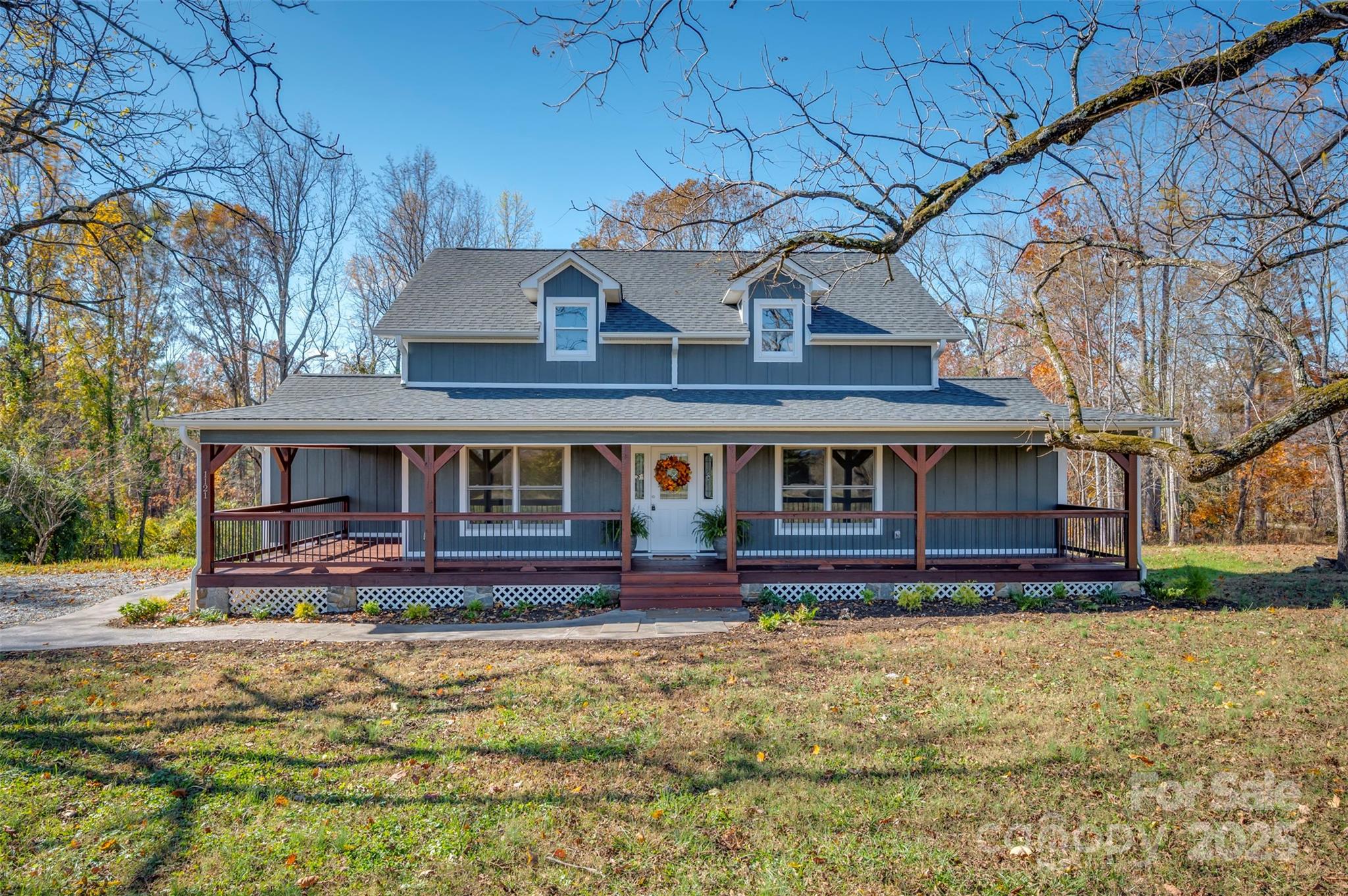 1121 Cove Road Rutherfordton, NC 28139 - Photo 8 of 41 a front view of a house with garden