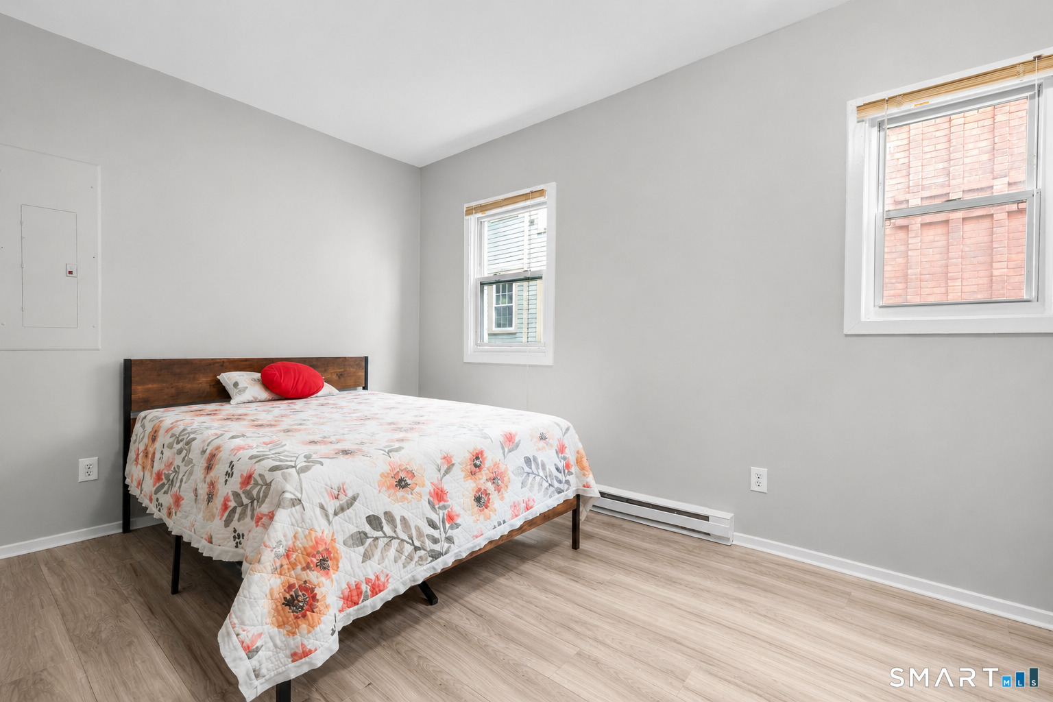 135 Prospect Street Waterbury, CT 06710 - Photo 4 of 19 a bedroom with a bed and a window