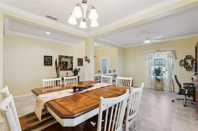 a view of a livingroom with workspace and a couch