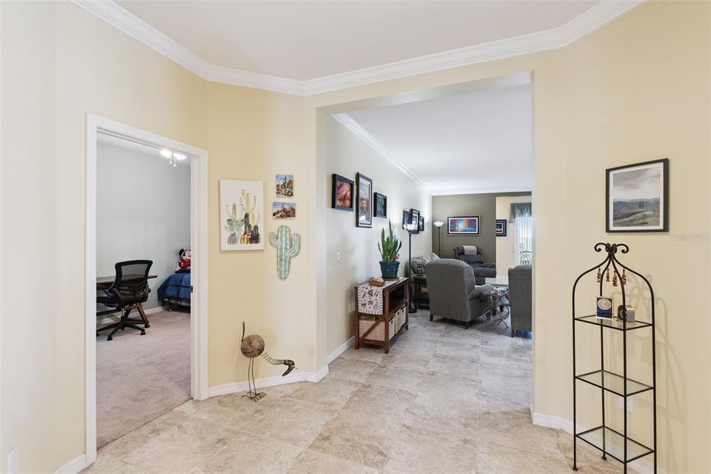 12332 Hammock Pointe Circle Clermont, FL 34711 - Photo 12 of 39 a view of a livingroom with workspace and a couch
