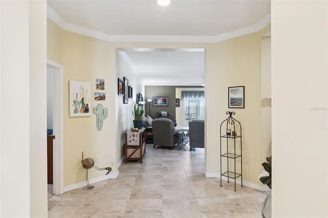 a view of living room filled with furniture and furniture