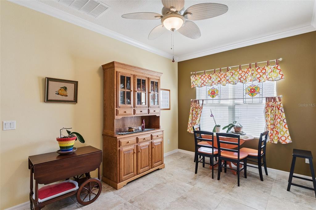 12332 Hammock Pointe Circle Clermont, FL 34711 - Photo 18 of 39 a view of a workspace with furniture and a window